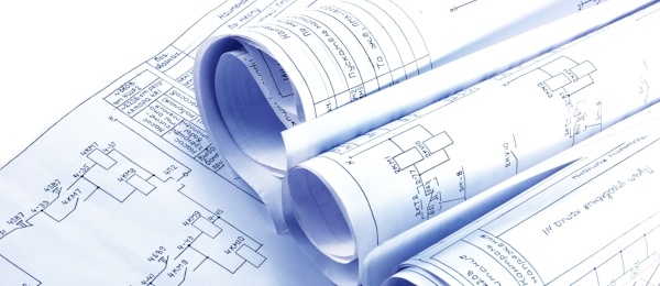 Rolls of printed blueprints or architectural plans.