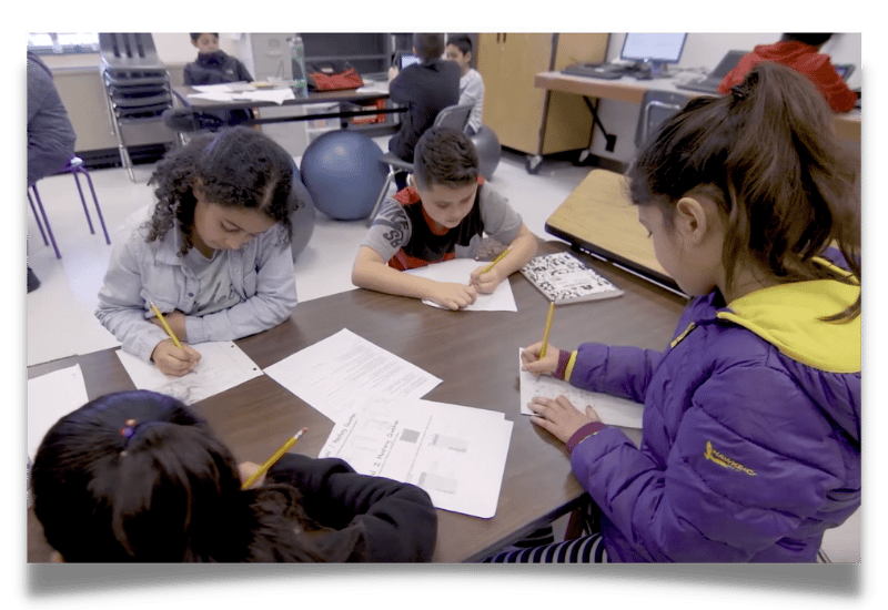 teacher in classroom with students2